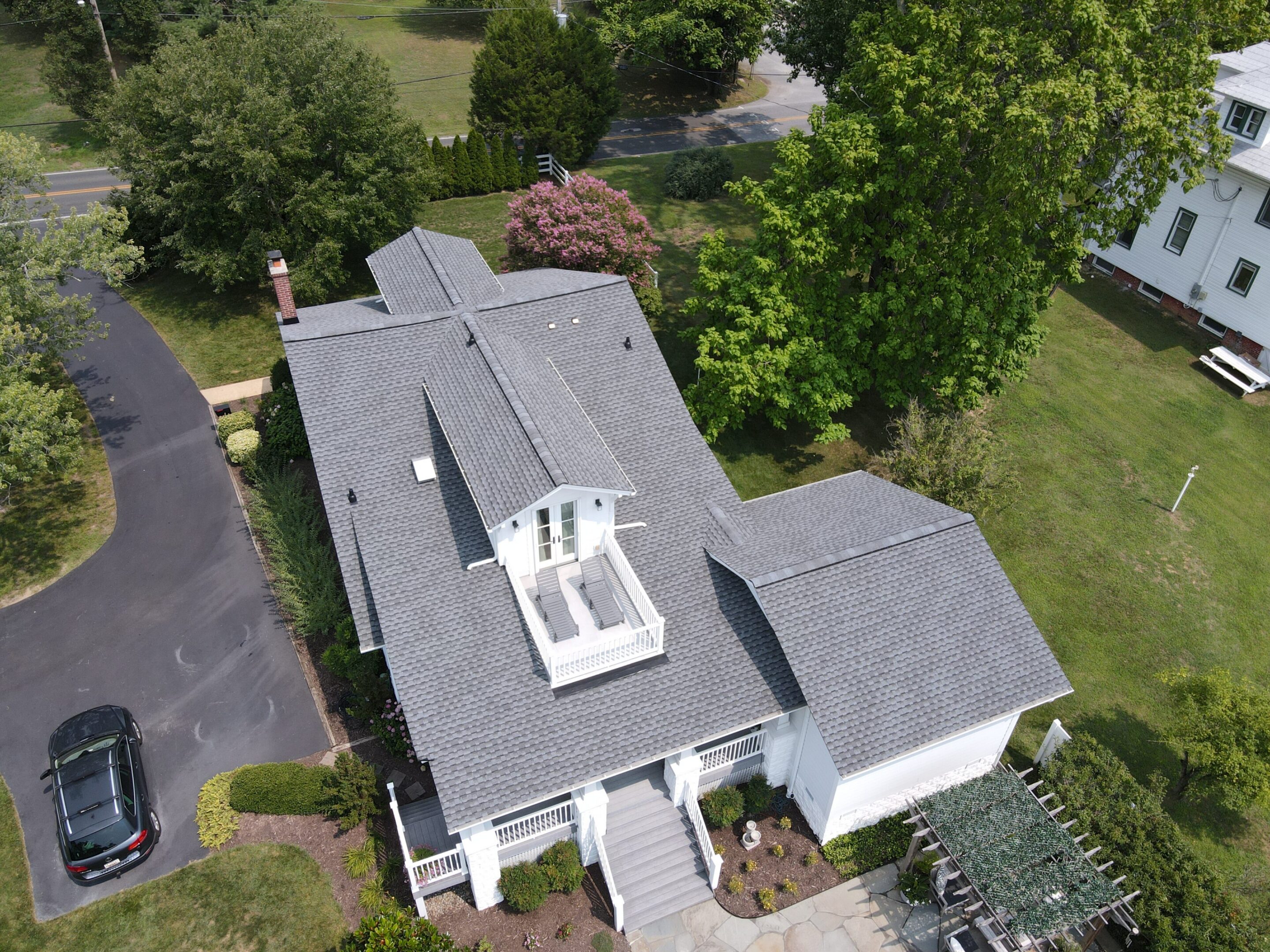 Aerial view of a house with garden.