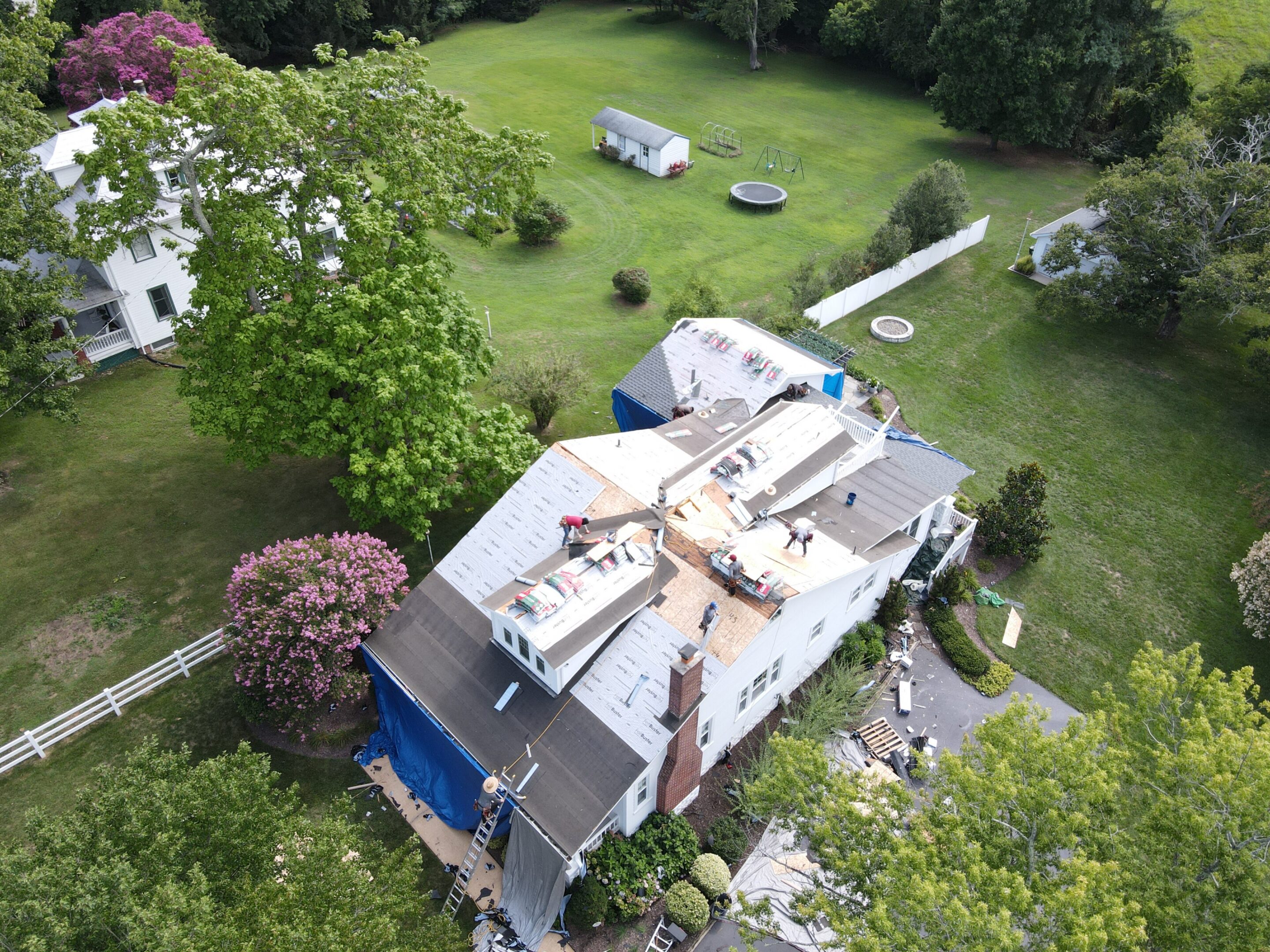 Aerial view of house under roof renovation.